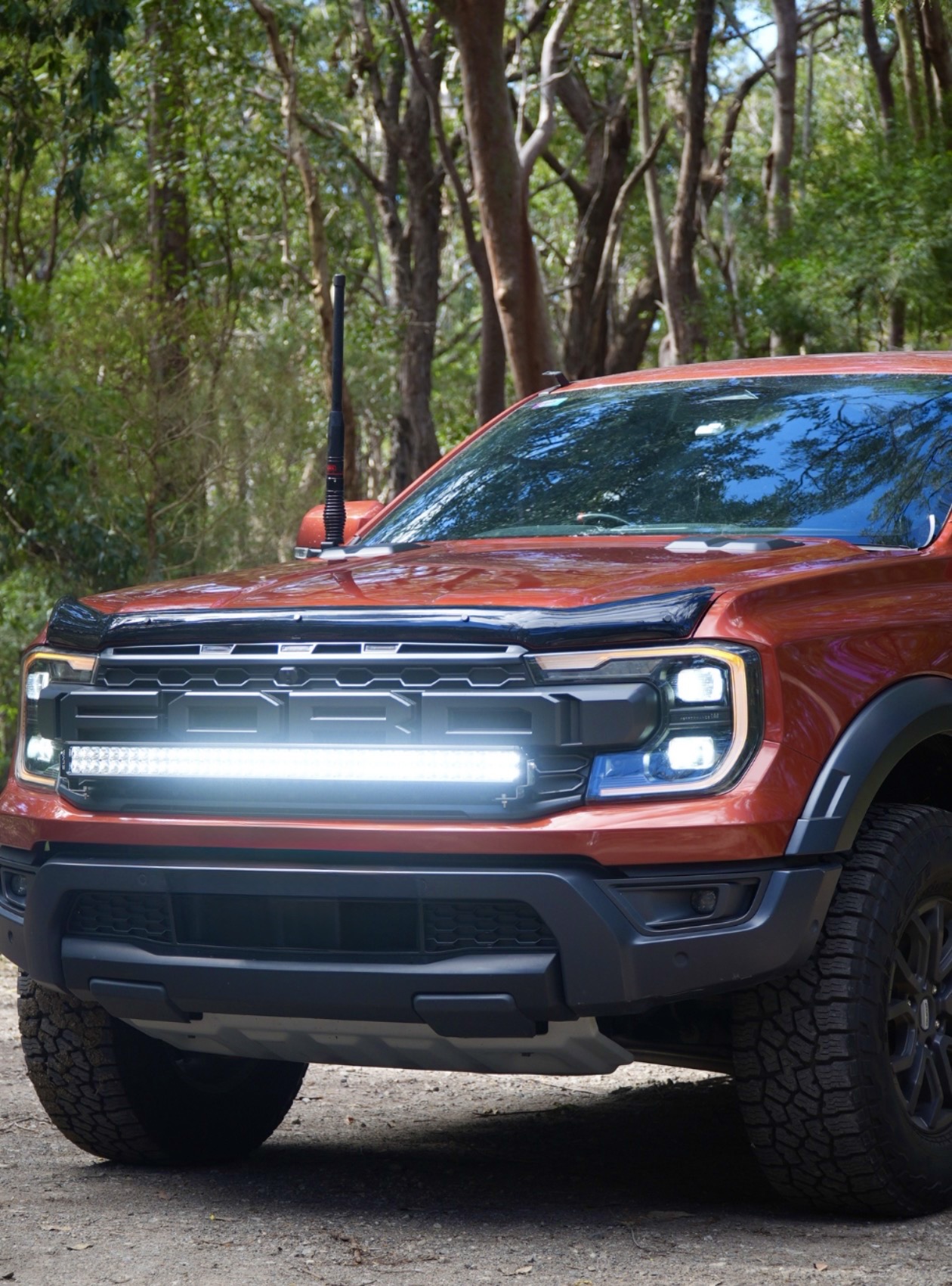 ELVA light bar installed on a red 4WD